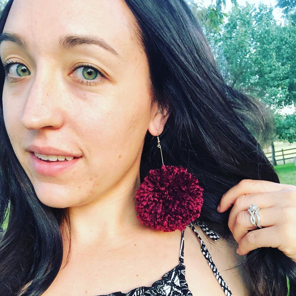 Large pom top pom earrings
